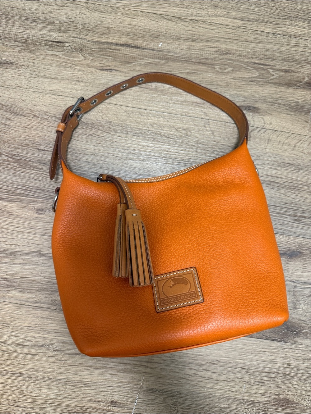 Dooney & Bourke Bright Orange Pebble Leather Shoulder Bag with Tassel